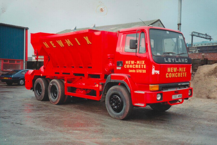 New Mix Concrete red vehicle